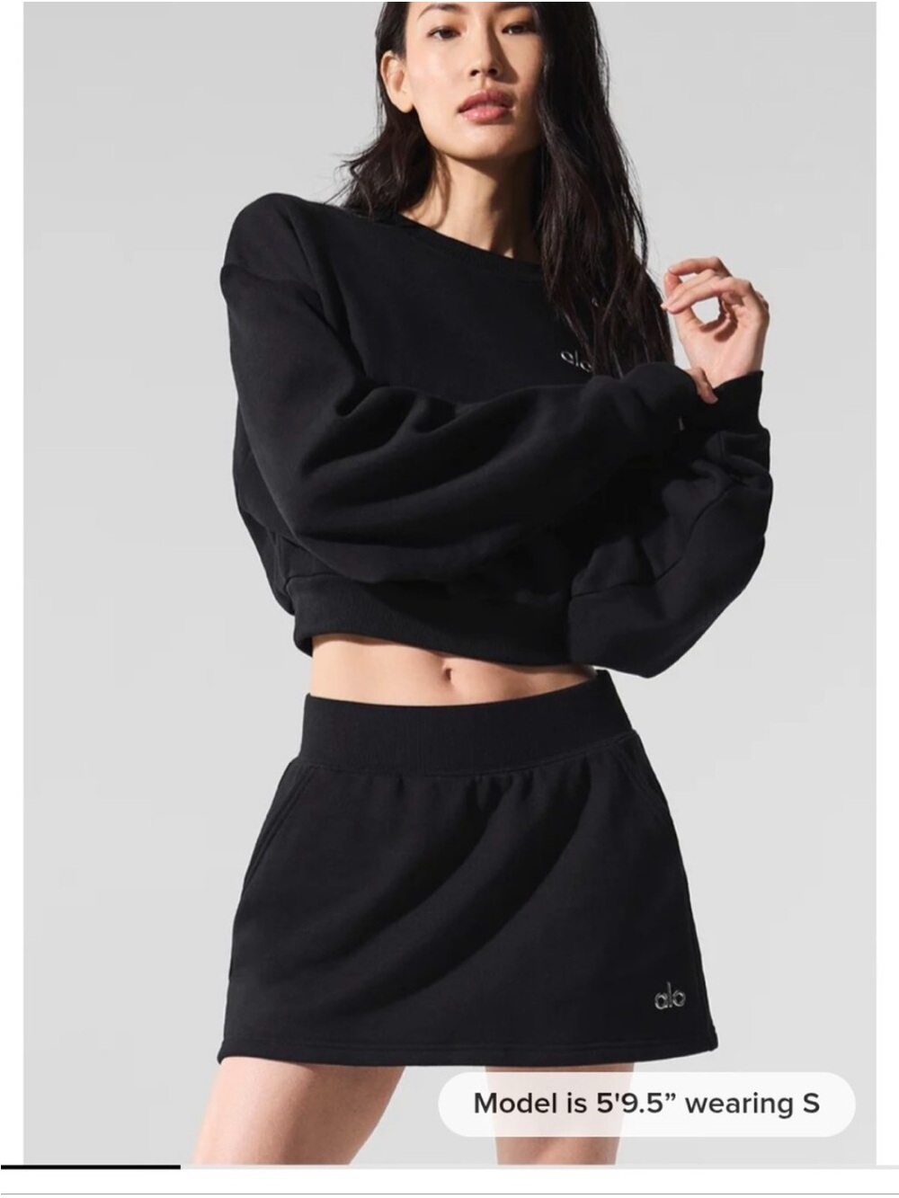 ALO Accolade Black Mini Skirt with Subtle Logo